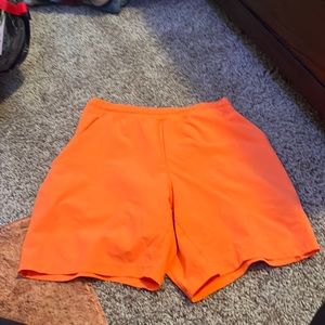 Mens Orange Lululemon pace breaker 5” shorts like new size small with liner